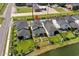 Aerial view of a home with its backyard, landscaping, and water view at 6706 Ocean Breeze Loop, Myrtle Beach, SC 29572