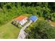 Scenic aerial view of home and shed with lush green landscaping at 709 Highway 90, Conway, SC 29526