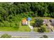 Green aerial view of home with blue roof and an orange metal roof at 709 Highway 90, Conway, SC 29526