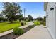 Beautiful front yard with landscaped shrubbery and lush green lawn at 709 Highway 90, Conway, SC 29526
