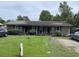 Charming brick duplex featuring a well-maintained lawn and inviting curb appeal at 719 11Th Ave. S, Myrtle Beach, SC 29577