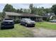 Inviting home exterior with a spacious yard and private driveway at 719 11Th Ave. S, Myrtle Beach, SC 29577
