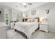 Charming bedroom offers a vanity, dresser, and queen-sized bed with neutral décor at 77 Capt Anthony White Ln., Georgetown, SC 29440