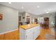 Spacious kitchen flows into the dining area, offering a breakfast bar and ample cabinet space at 77 Capt Anthony White Ln., Georgetown, SC 29440