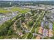 Aerial view of community featuring ponds, tree lined streets, and convenient shopping areas at 800 Egret Circle # 53, Little River, SC 29566