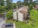 Aerial view of townhomes, showcasing lawns, landscaping, parking, and exterior architecture at 800 Egret Circle # 53, Little River, SC 29566