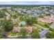 Aerial view showcasing the community pool, lush landscaping, and multiple townhome buildings at 800 Egret Circle # 53, Little River, SC 29566