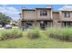 Well-manicured backyard with a lawn, patio, lush greenery, privacy fence, and exterior HVAC unit at 800 Egret Circle # 53, Little River, SC 29566