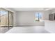 Bright living space with sliding glass doors to the patio, wood-look flooring, and natural light at 800 Egret Circle # 53, Little River, SC 29566