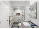 Updated bathroom showcasing a frameless glass shower, marble surround, and sleek fixtures, creating a spa-like atmosphere at 867 Cardinal Pl., North Myrtle Beach, SC 29582