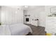 Spacious bedroom featuring a fireplace, hardwood floors, and custom built-in wardrobe for ample storage space at 867 Cardinal Pl., North Myrtle Beach, SC 29582
