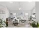 Spacious living room with high ceilings, a modern white sectional, and plenty of natural light at 867 Cardinal Pl., North Myrtle Beach, SC 29582