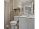 Bathroom features a vanity sink with white cabinetry and a shower-tub combo at 100 Brookgreen Trace Pl., Pawleys Island, SC 29585