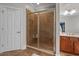 Walk in shower with built-in bench in well appointed ensuite bathroom at 100 Brookgreen Trace Pl., Pawleys Island, SC 29585