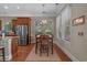 Charming breakfast nook with hardwood floors and a window providing natural light at 100 Brookgreen Trace Pl., Pawleys Island, SC 29585