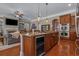 Kitchen island with granite countertops, bar seating, and stainless steel appliances at 100 Brookgreen Trace Pl., Pawleys Island, SC 29585
