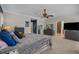 Comfortable main bedroom with plush bedding, ample closet space, and an ensuite bathroom at 100 Brookgreen Trace Pl., Pawleys Island, SC 29585
