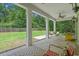 Spacious outdoor patio with beautiful backyard views, perfect for entertaining or relaxing at 100 Brookgreen Trace Pl., Pawleys Island, SC 29585