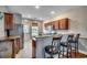 Well-equipped kitchen featuring stainless steel appliances, granite countertops, and bar seating at 100 Culpepper Way # 1002, Myrtle Beach, SC 29579