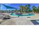 Community pool featuring shallow areas with palms and shaded lounging for Gathering fun in the sun at 100 Culpepper Way # 1002, Myrtle Beach, SC 29579