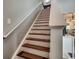 Staircase with patterned risers and dark wood treads lead to the upper level at 100 Culpepper Way # 1002, Myrtle Beach, SC 29579
