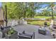 Inviting back deck with outdoor seating and a grill, perfect for entertaining with golf course views at 1064 Links Rd., Surfside Beach, SC 29575