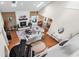 Open living room with fireplace, vaulted ceilings, and hardwood floors at 1064 Links Rd., Surfside Beach, SC 29575