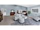 Spacious main bedroom with sitting area, ensuite bathroom, and tasteful decor at 1064 Links Rd., Surfside Beach, SC 29575