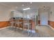 Kitchen featuring barstool seating, granite counters, and stainless steel appliances at 110 South Shore Blvd. # 203, Longs, SC 29568