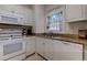 Kitchen with stainless steel appliances and window at 110 South Shore Blvd. # 203, Longs, SC 29568