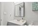 Bathroom features a light blue vanity with modern faucet and a square mirror at 1100 Possum Trot Rd. # F218, North Myrtle Beach, SC 29582