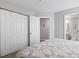 Bedroom with closet and entrance to ensuite bathroom at 1100 Possum Trot Rd. # F218, North Myrtle Beach, SC 29582