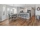 Cozy living and dining area with an open kitchen, plenty of seating and natural light at 1100 Possum Trot Rd. # F218, North Myrtle Beach, SC 29582