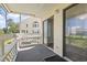 Private outdoor patio with sliding glass doors and clear views of the community at 1100 Possum Trot Rd. # F218, North Myrtle Beach, SC 29582