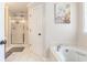 Bathroom view featuring shower stall, modern tile floor, and soaking tub at 1134 Carleita Circle, Conway, SC 29527