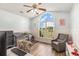 Bedroom/bedroom featuring a ceiling fan, a large window, a crib, and wood flooring at 1134 Carleita Circle, Conway, SC 29527