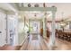 Inviting foyer features hardwood floors, neutral paint, and open access to the living spaces at 1134 Carleita Circle, Conway, SC 29527