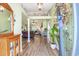 Bright foyer with wood floors and natural light leads into open concept living areas at 1134 Carleita Circle, Conway, SC 29527