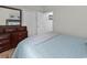 This bedroom offers a comfortable bed with a beautiful dresser and access to a closet at 1314 Prescott Circle, Myrtle Beach, SC 29577