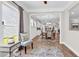 Bright dining area showcasing hardwood floors, contemporary lighting, and an open layout leading into the kitchen at 1314 Prescott Circle, Myrtle Beach, SC 29577