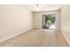 Bedroom features sliding glass door to the outside and neutral carpeting at 137 Hickory Dr., Conway, SC 29526