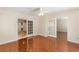 Spacious bedroom featuring hardwood floors and french door access at 137 Hickory Dr., Conway, SC 29526
