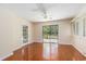 Bright bedroom with ceiling fan, hardwood floors and backyard view at 137 Hickory Dr., Conway, SC 29526