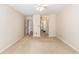 Large bedroom view to hallway with neutral colored walls and carpet at 137 Hickory Dr., Conway, SC 29526