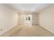 Neutral bedroom with sliding doors providing backyard views at 137 Hickory Dr., Conway, SC 29526