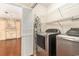Convenient laundry room with modern washer, dryer, and shelving at 137 Hickory Dr., Conway, SC 29526