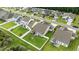Aerial view of home showcasing fenced backyard, screened porch, and neighborhood at 138 Copper Leaf Dr., Myrtle Beach, SC 29588
