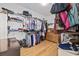 Walk-in closet with organized shelving and hanging space, maximizing storage efficiency at 138 Copper Leaf Dr., Myrtle Beach, SC 29588