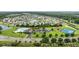 Aerial view of the community pool, clubhouse, playground, parking, and recreational areas at 138 Copper Leaf Dr., Myrtle Beach, SC 29588