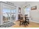 Bright dining area with wood floors, natural light, and access to the screened porch at 138 Copper Leaf Dr., Myrtle Beach, SC 29588